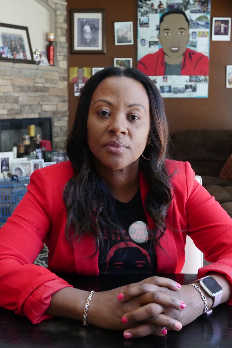 Charmaine Lawson sits in her living room in Perris, California.