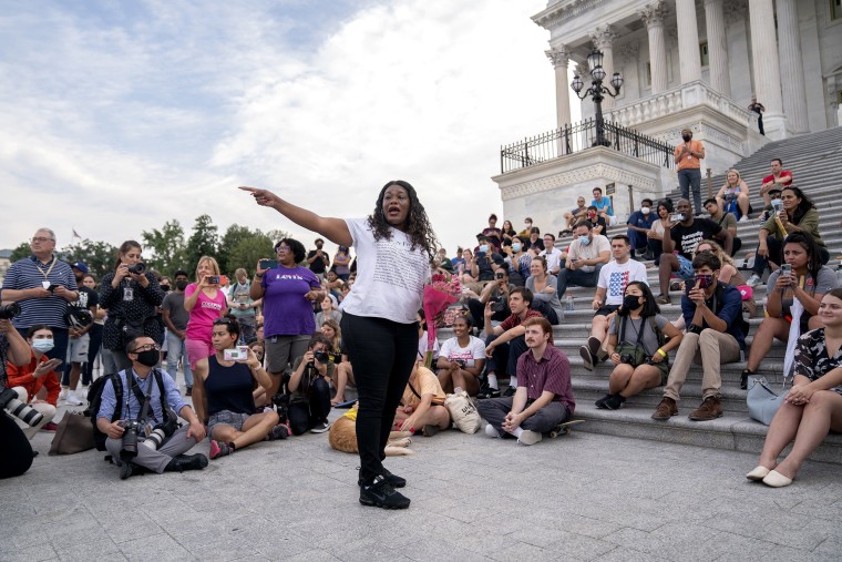 Image: Rep. Cori Bush (D-Mo.) speaks to demonstrators outside the Capitol in Washington on Tuesday, Aug. 3, 2021, after the Biden administration announced it was readying a new targeted federal moratorium on evictions. (Stefani Reynolds/The New York Times