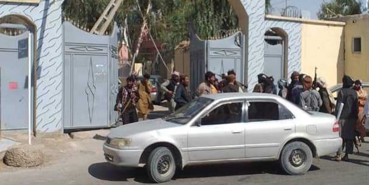 Image: Taliban fighters seen in Zaranj on Friday after the group overran the provincial capital.