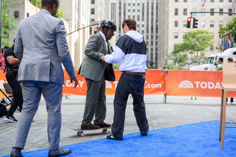 Jagger Eaton teaches Al Roker to skateboard