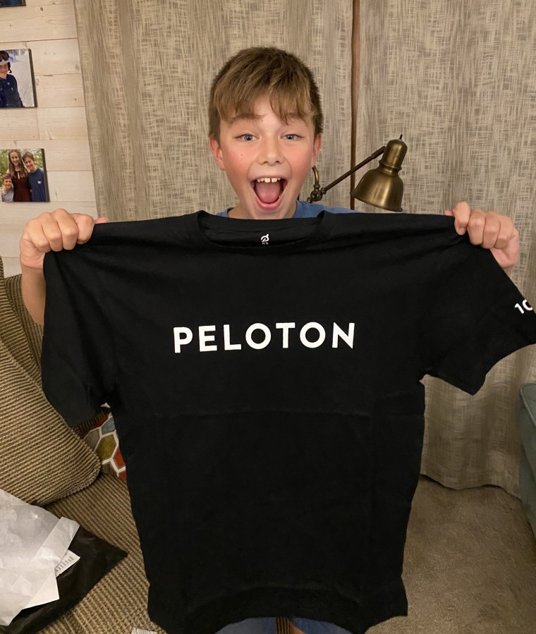 Alex Bevan, 10, received a "century club" T-shirt from Peloton for completing 100 meditations within the app.