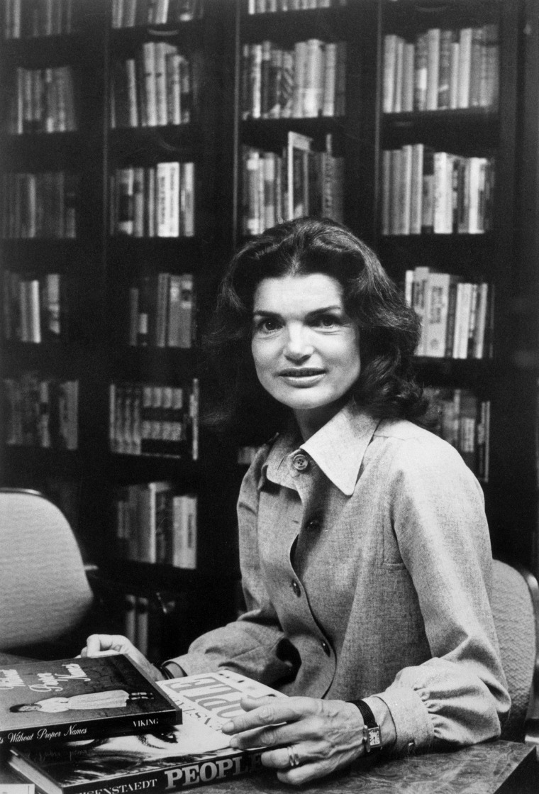 Jacqueline Kennedy Onassis Sitting at Desk With Books