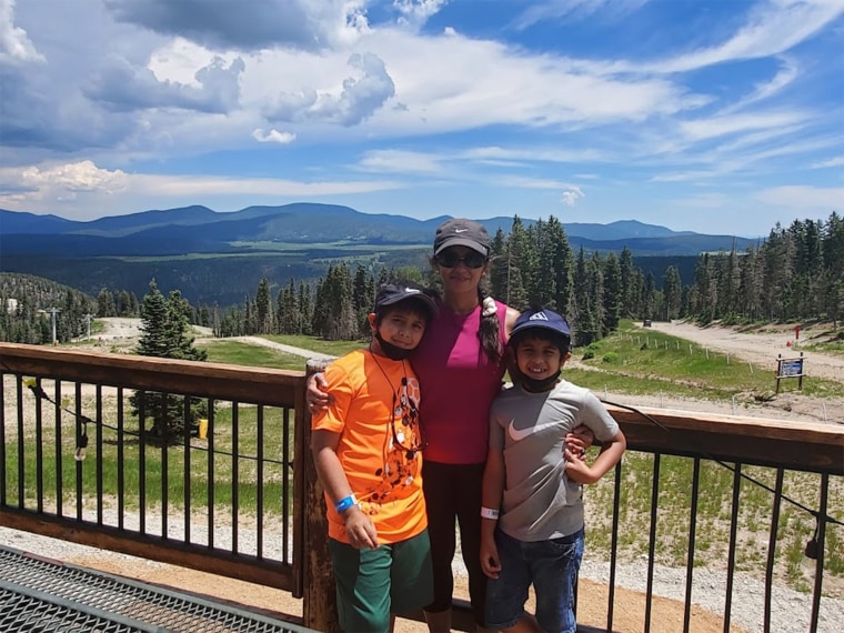 Ozair Mohiuddin, 11, with his mom, Khona, and little brother Omair, 8