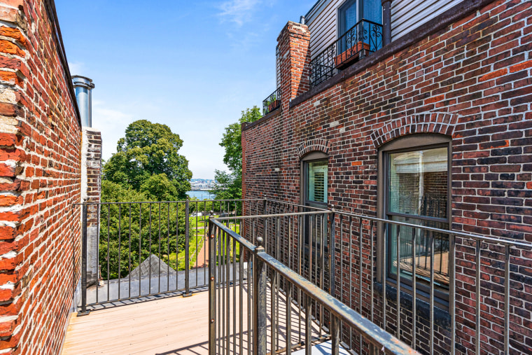 The so-called "Spite House" has multiple outdoor spaces, including this roof deck. 