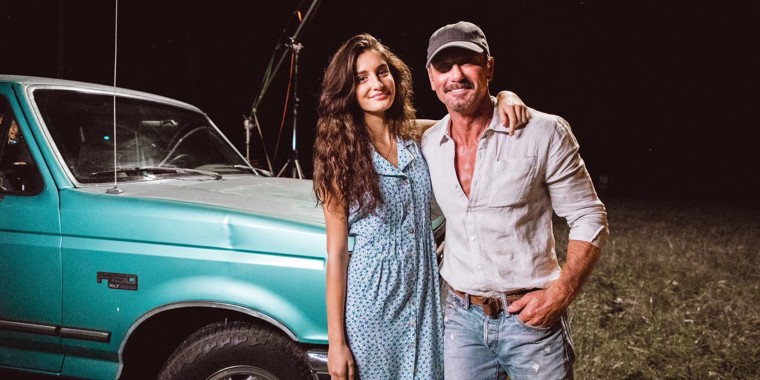 Country star Tim McGraw and his youngest daughter Audrey pose on the set of McGraw's first music video since 2018. His daughter played the lead character.