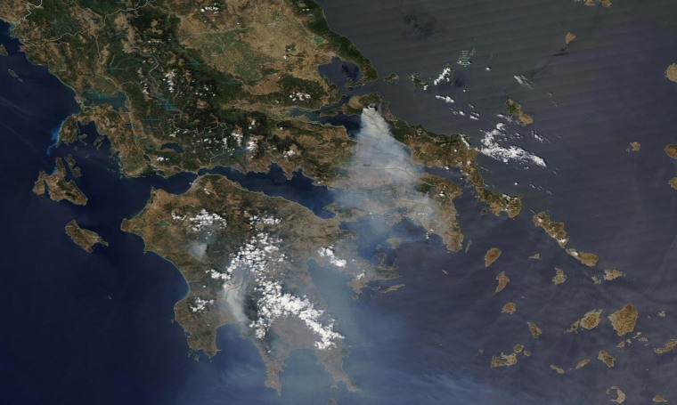 Image: A satellite image shows smoke caused by wildfires in Greece