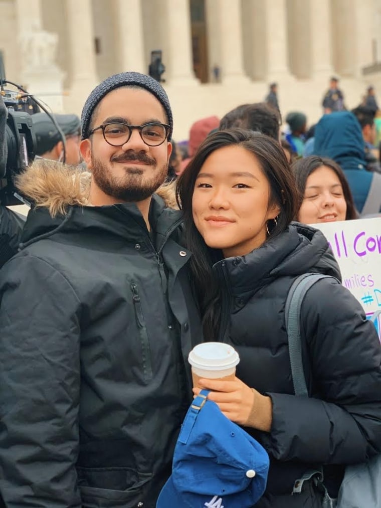 Lee, right, with a friend attending a DACA rally outside of the Supreme Court in 2020.
