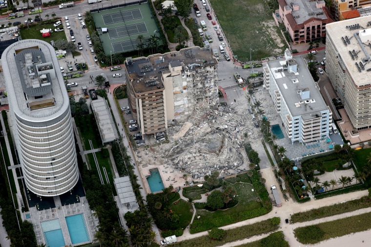 Image: Search and rescue teams work in the rubble after a partial collapse of a 12-story condo tower in Surfside, Fla., on June 24, 2021.
