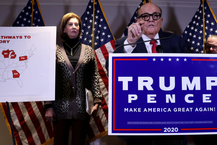 Image: Sidney Powell, an attorney later disavowed by the Trump campaign, participates in a news conference with President Donald Trump's personal lawyer Rudy Giuliani at the Republican National Committee headquarters on Capitol Hill