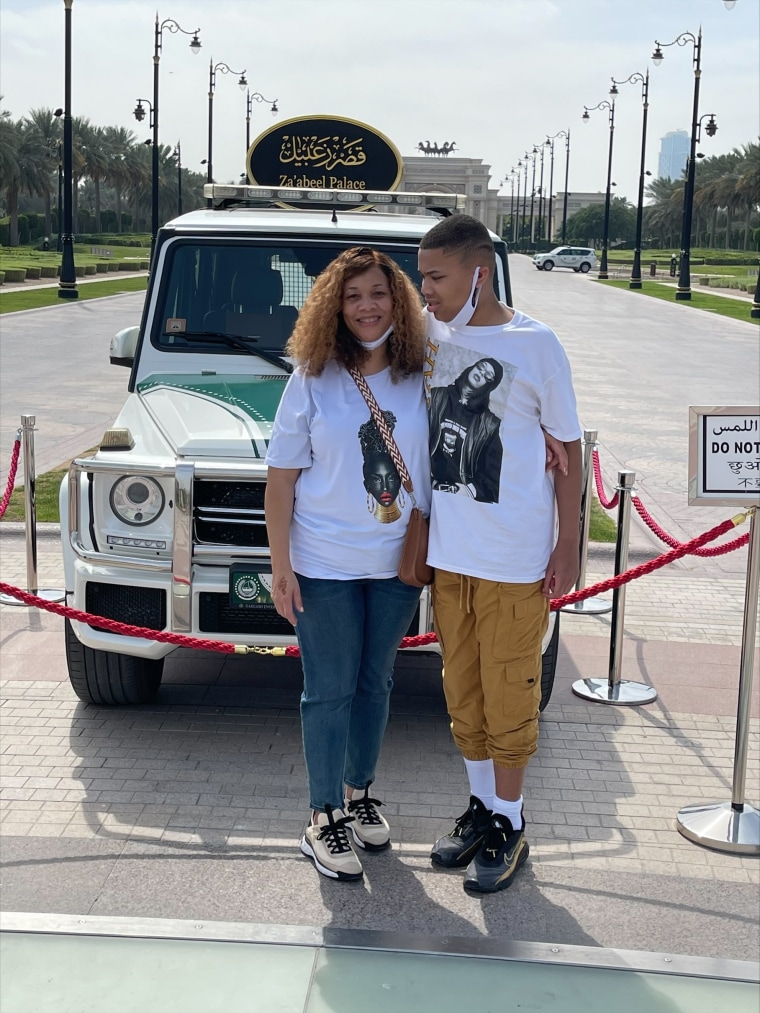 Camille Proctor, executive director and founder of the Color of Autism Foundation, is pictured with her teenage autistic son.