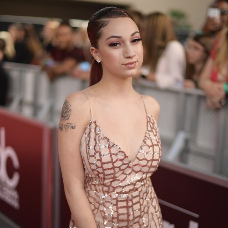 Bregoli in a floor length sparkling gown and ponytail deadpans to the camera