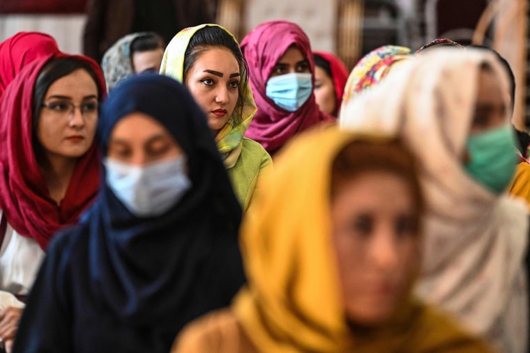 Image: Afghan women take part in a gathering at a hall in Kabul on Aug. 2, 2021 against the claimed human rights violations on women by the Taliban regime in Afghanistan.