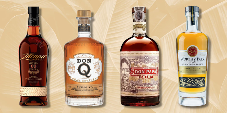 Illustration of four different rum bottles on a tropical palm background