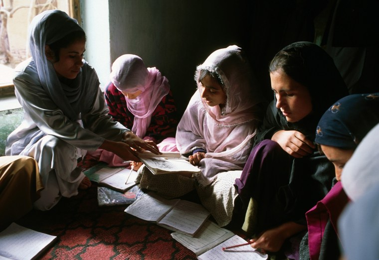 Image: A nonformal education class for adolescent girls run by a nonprofit in Kabul, Afghanistan, in 2000.