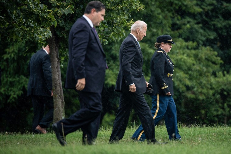 Image: President Joe Biden walks to Marine One at Fort McNair after returning to the White House on Aug. 16, 2021.