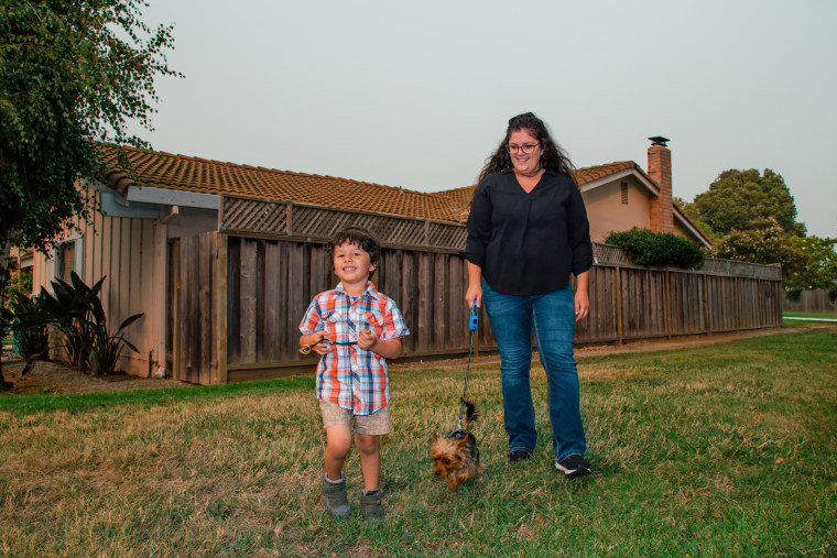 IMAGE: Madeleine Rivera and her son, August, in Fremont, Calif.