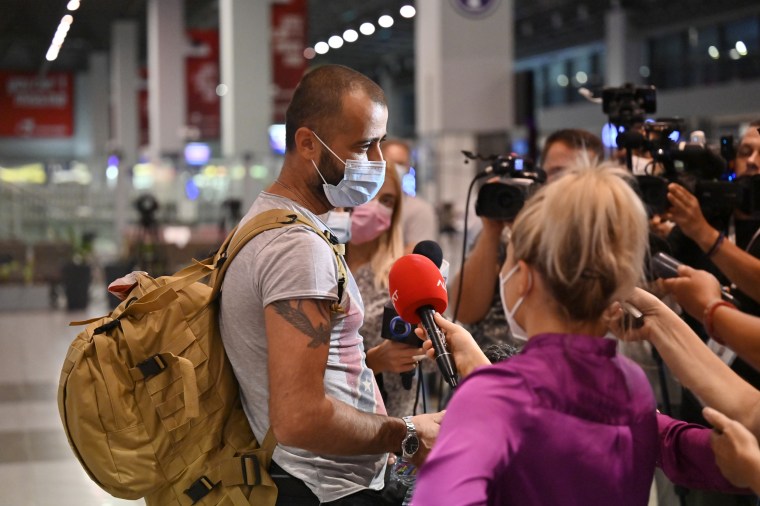 IMAGE: Mehmed Rexhepi speaks to reporters