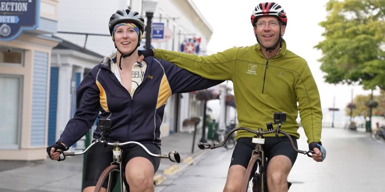 Father and daughter biking