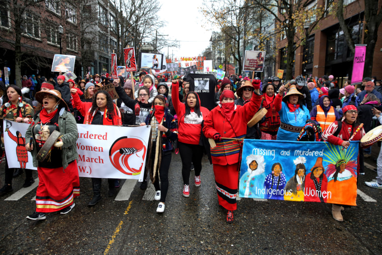 IMage: The families and friends of missing or murdered indigenous women march through the streets of Seattle on Jan. 20, 2018.