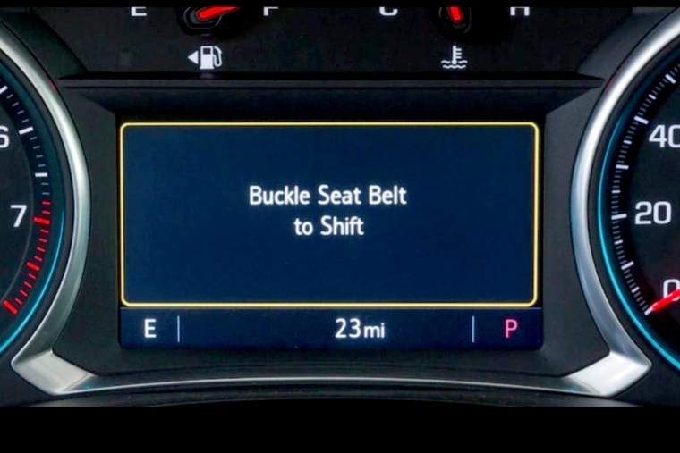 A view of a Chevrolet control panel reminding the driver to wear a seatbelt.