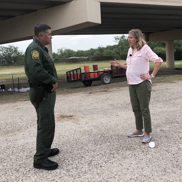 NBC News correspondent Julia Ainsley speaks to a border patrol agent while reporting from the U.S.-Mexico border in July 2021.