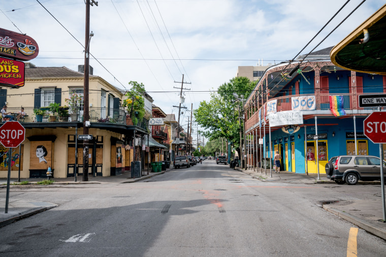 Typically packed with musicians, artists, locals and tourists visiting its many bars and music venues, Frenchman Street is seen nearly empty on the first day of Jazz Fest, April 23, 2020, in New Orleans.