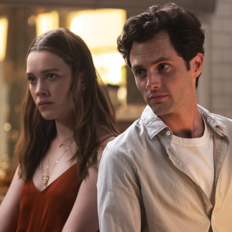 Penn Badgley and Victoria Pedretti in "You"