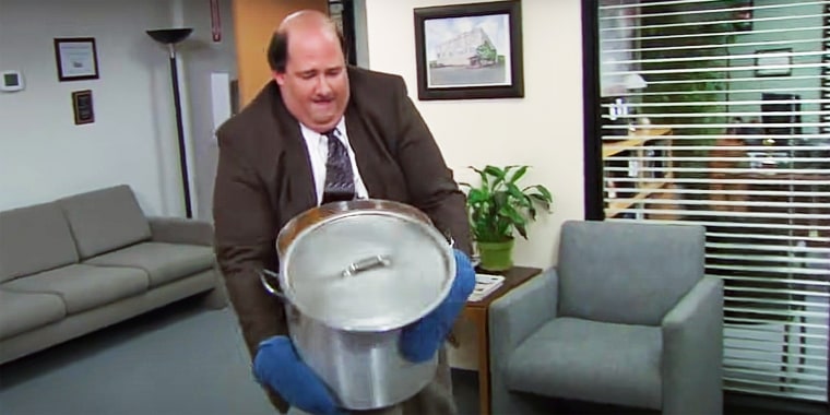 Kevin carrying heavy chili pot