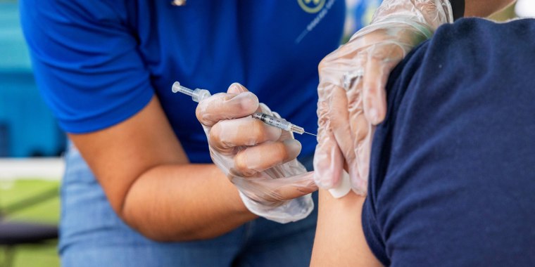Members of Unidos Contra COVID promote vaccinations in Pennsylvania