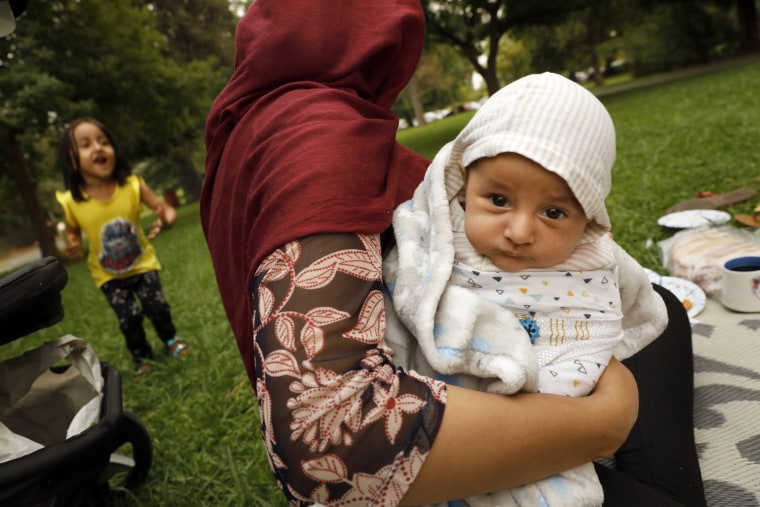 One-month-old Fitrat is one of the newest members of the Afghan community of Sacramento, California.