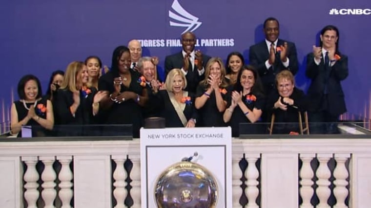 Cynthia DiBartolo (c), rings the bell during the NYSE closing auction on July 8, 2021.