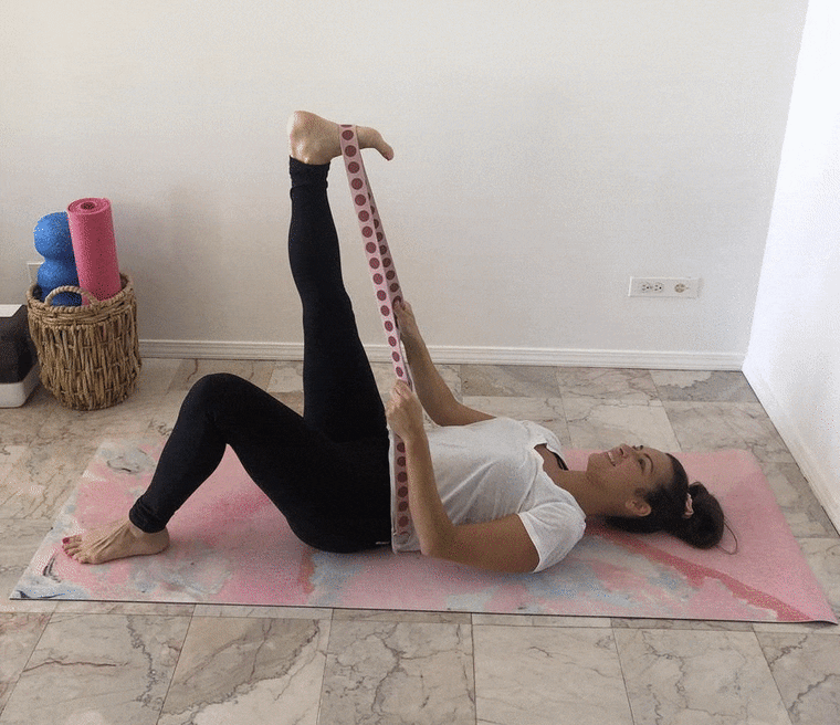 How a Yoga Strap Can Save Your Spine
