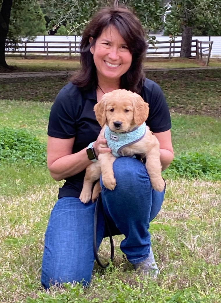 Denise Corliss is pictured with Finn, Bretagne's little sister, in 2020.