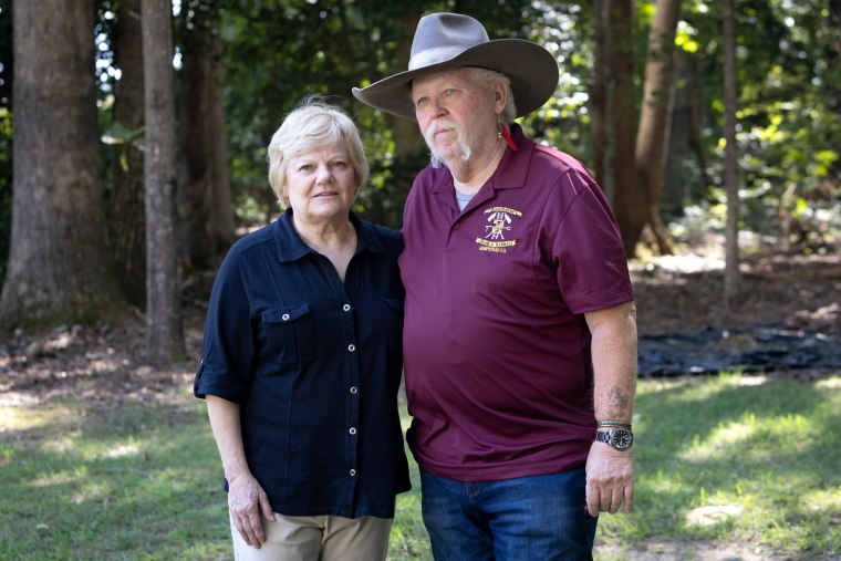 Kevin Maxwell with his wife, Pat Aubert, at their home in Spotsylvania, Va.