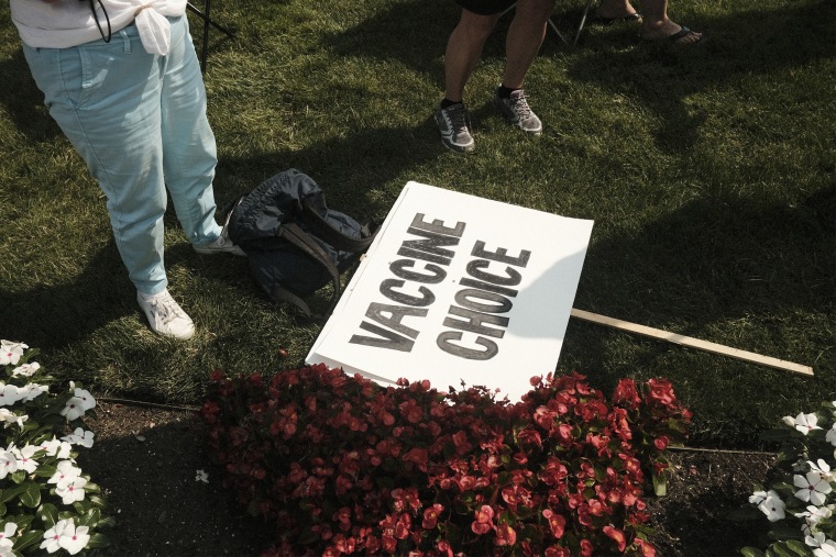 A sign during a protest against Covid-19 vaccination mandates in Lansing, Michi., on Aug. 6, 2021.