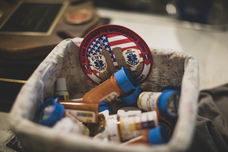 Image: A basket filled with medication taken daily by Jennifer Waddleton at her home on Sept. 9, 2021 in Lehigh Acres, Fla.