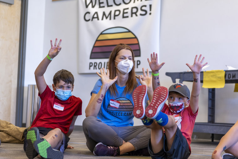 Monika Jaworska, a volunteer with Project:Camp, plays with campers at The Discovery Museum in Reno, Nevada on September 8, 2021. 