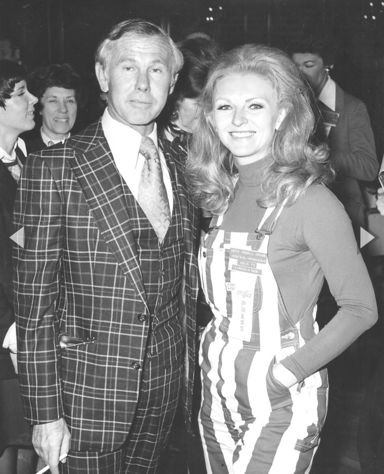 Leta Powell Drake poses for a photo with Johnny Carson.