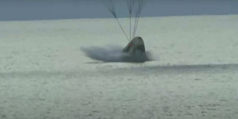 In this image taken from video a SpaceX capsule carrying four people splashes down in the Atlantic off the Florida coast, Saturday, Sept. 18, 2021. The all-amateur crew was the first to circle the world without a professional astronaut.