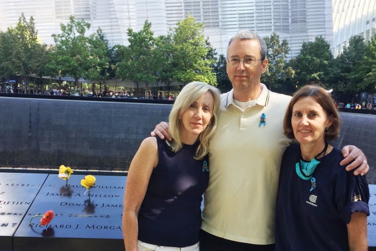 Image: Glenn Morgan with his sisters Colleen Golden, left, and Cathy Morgan at the 9/11 memorial in New York City.