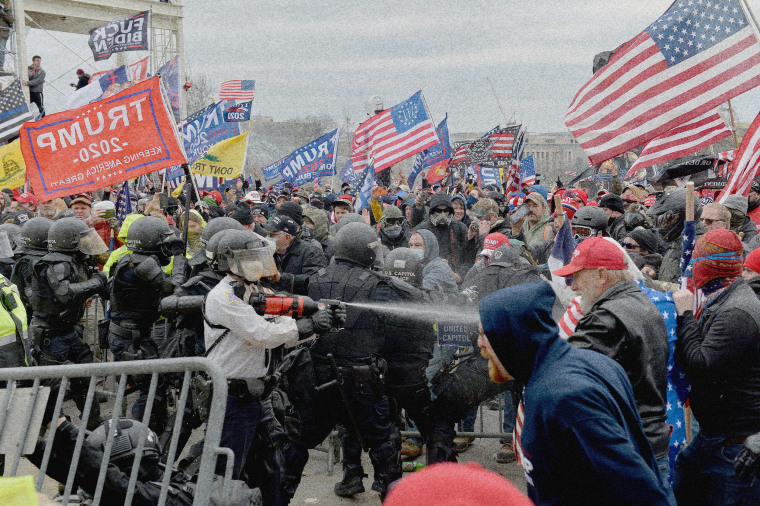 Image: A pro-Trump mob clashes with police and security forces at the Capitol on Jan. 6, 2021.