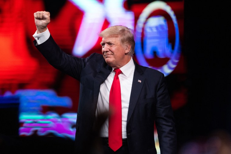 Former President Donald Trump pumps his fist as he walks off after speaking at the Conservative Political Action Conference (CPAC) in Dallas on July 11, 2021.