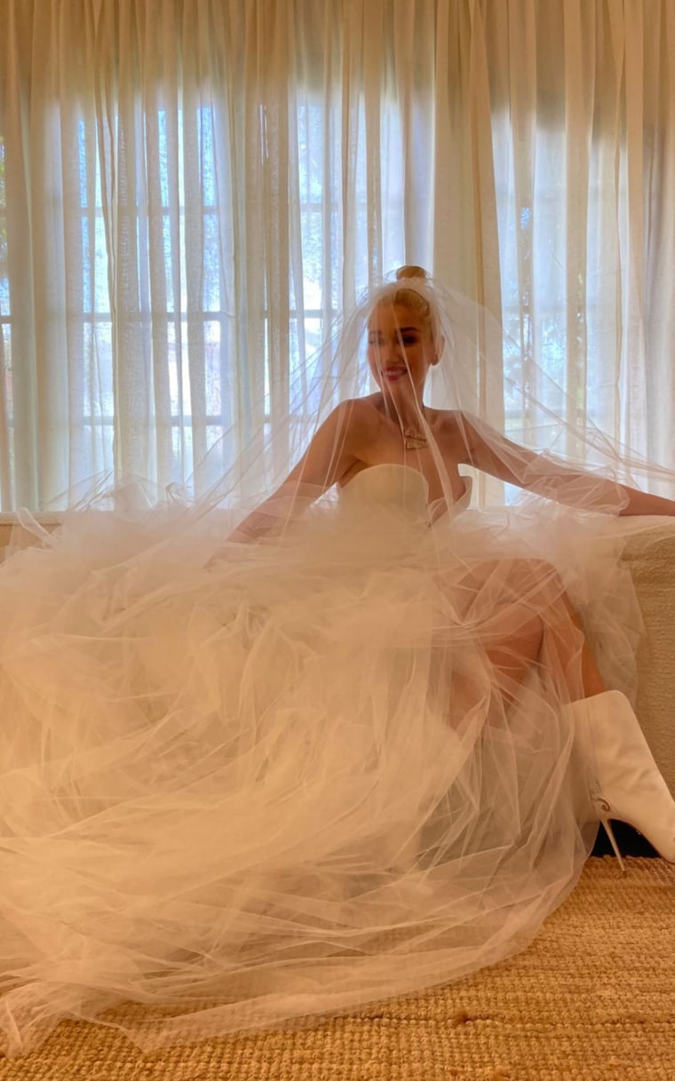 Gwen Stefani shares pics from wedding dress fitting before marrying Blake Shelton