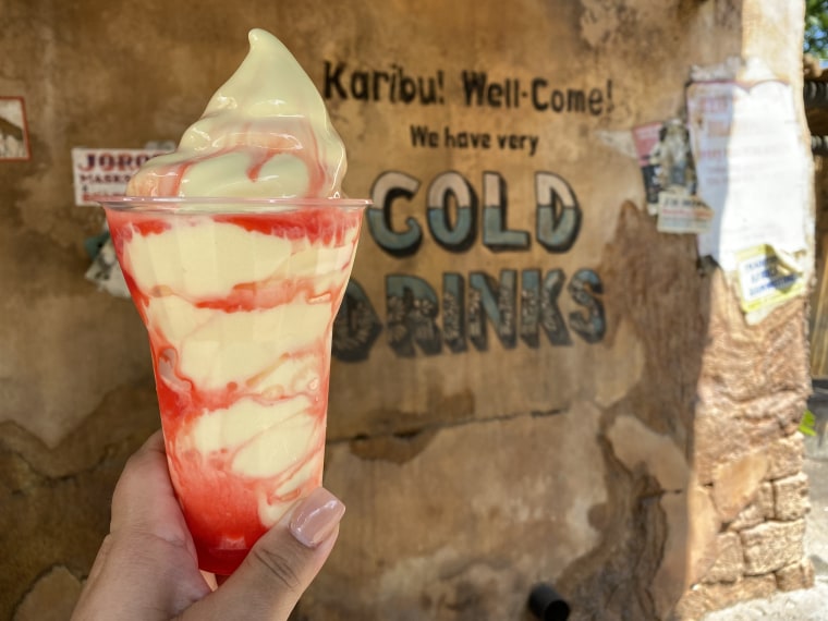 This Simba Sunset Dole Whip is served at Tamu Tamu Refreshments inside Disney's Animal Kingdom Theme Park.