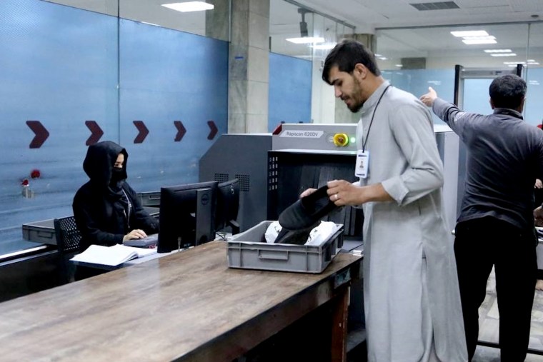 Female employees at Taliban-controlled Kabul airport return to work