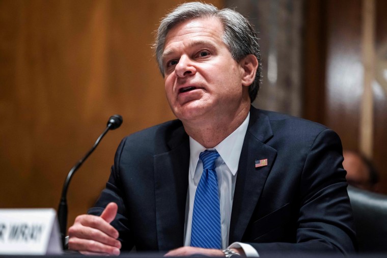 FBI Director Christopher Wray testifies during a hearing at the Capitol on Sept. 21, 2021.