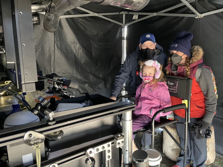 Molly Smith Mezler and daughter "Cora" on the set of "MAID."