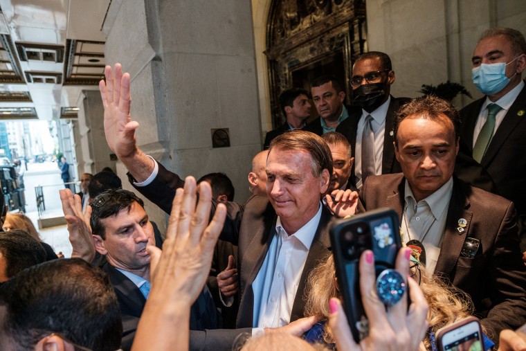 Image: Brazil's President Jair Bolsonaro greets supporters outside his hotel during the 76th Session of the U.N. General Assembly in New York
