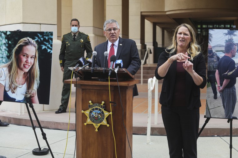 Cal Poly President Jeffrey Armstrong, center, speaks in San Luis Obispo, Calif., on April 13, 2021, about student Kristin Smart, who went missing 25 years earlier.