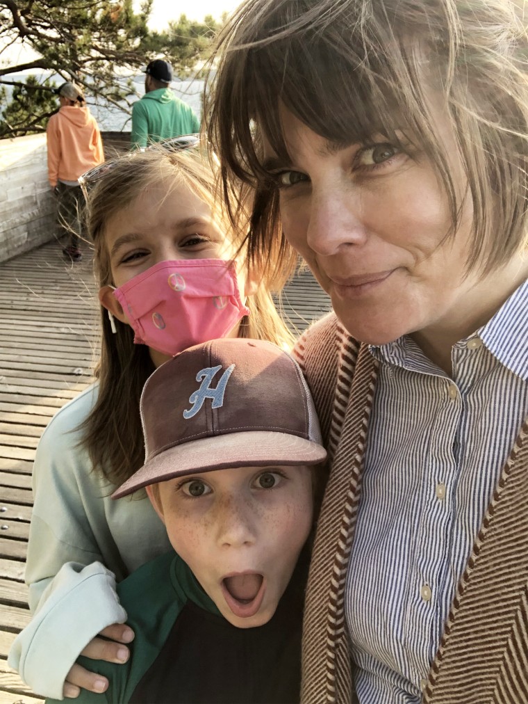 Selfie taken by woman with two children